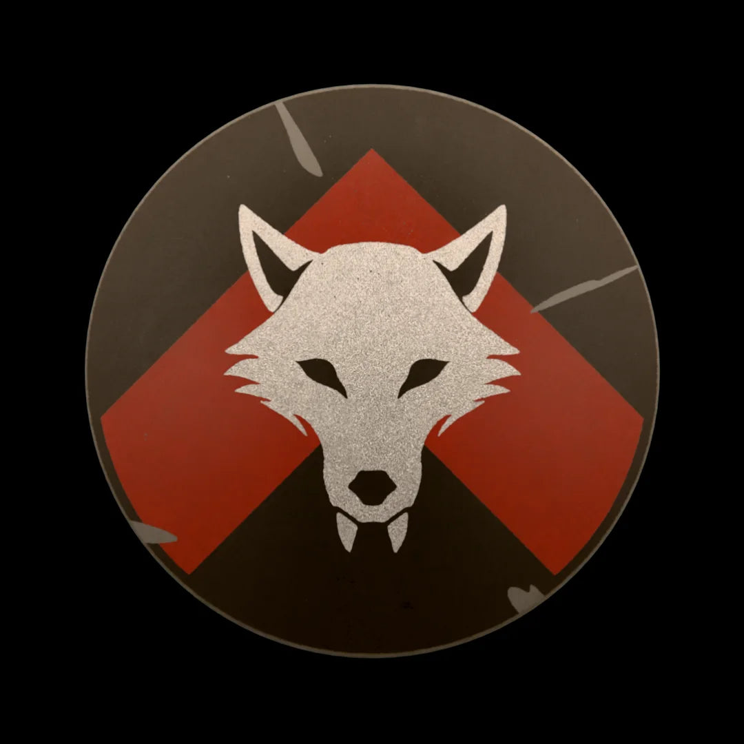 Castle Clad Bricks Dark Bluish Grey round shield with Metallic Silver wolf head on Dark Red chevron on black backing. Light damage edition.