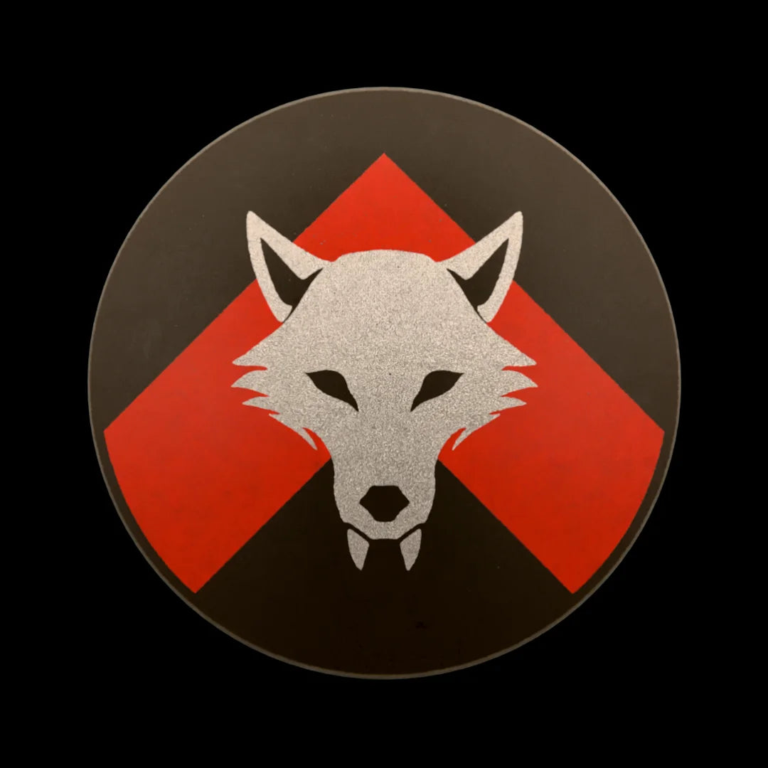 Castle Clad Bricks Dark Bluish Grey round shield with Metallic Silver wolf head on Red chevron on black backing. Pristine edition.